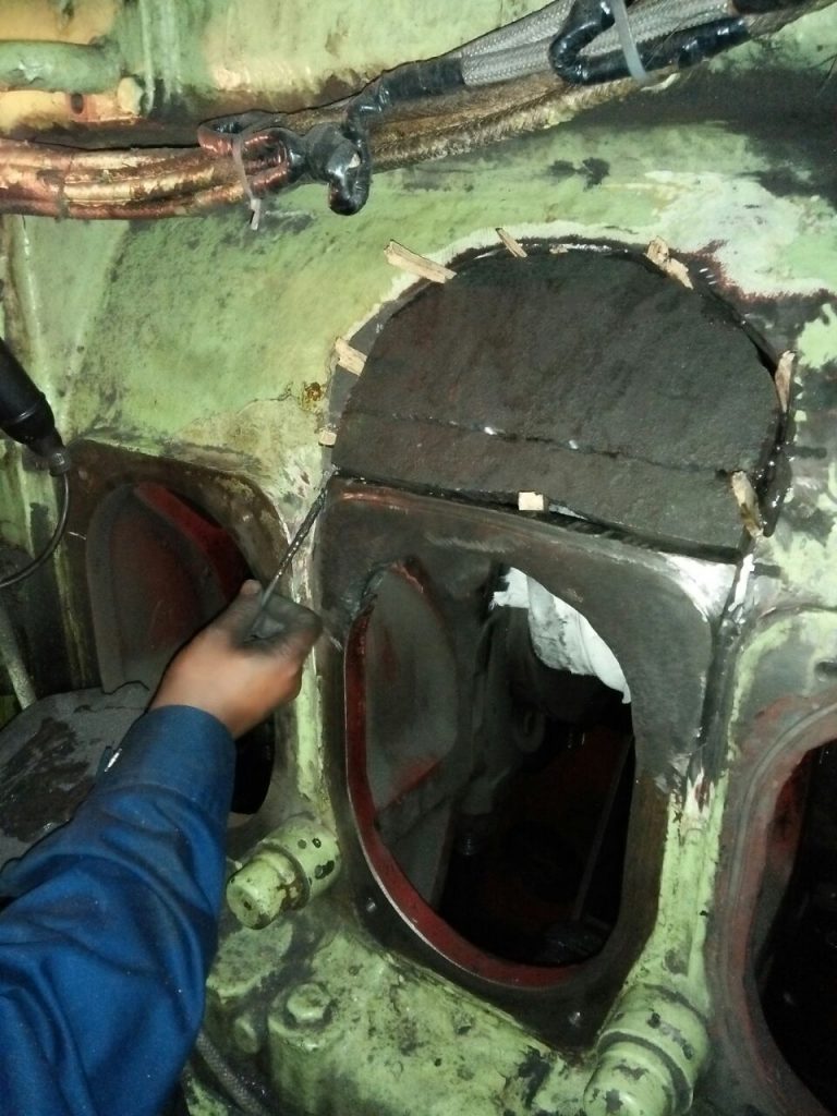 Casting Piece Stitched in Broken Area of Engine Block